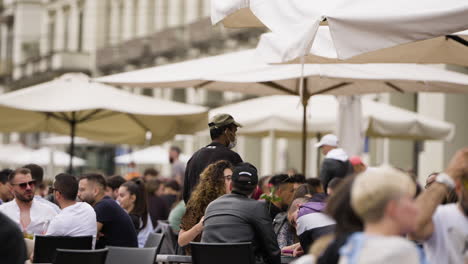 Slow-motion-scene-of-outdoor-seating-at-cafe-in-Turin-centre-in-Italy