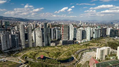 Aerial-Timelapse-with-view-of-skyscrapers-at-Mexicana-Park-in-Santa-Fe---Mexico-City
