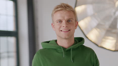 Handsome-blond-caucasian-man-smiling-looking-straight-at-camera
