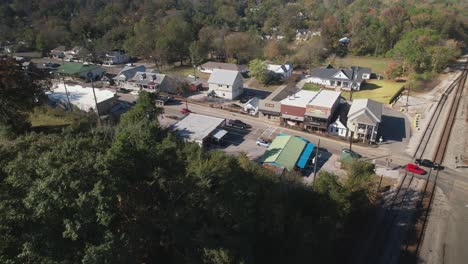 Aerial-approach-of-small-town-shops-and-eateries-in-Old-Town-Helena,-Alabama