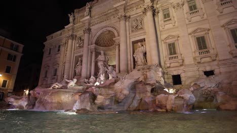 Trevi-Fountain-in-Rome-Italy-Tilt-up-in-slow-motion-at-Night