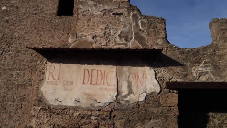 Italy-Pompeii-writing-on-wall-pan-left-to-right