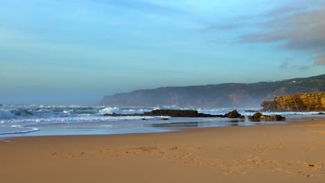 Cascais-Guincho-Beach-near-Sintra-Estoril-in-Europe-during-beautiful-vivid-Sunset-color-Atlantic-Ocean