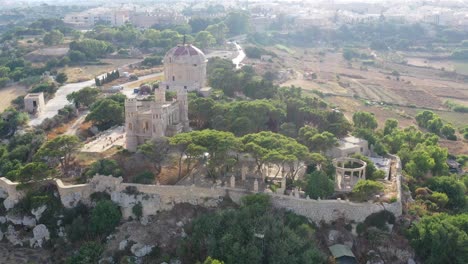 Aerial-View-Of-Hilltop-Tal-Virtu-Castle-Located-In-Rabat,-Malta