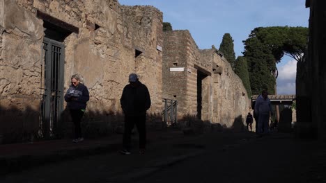 Pompeii,-Italy-people-walking-and-shadow