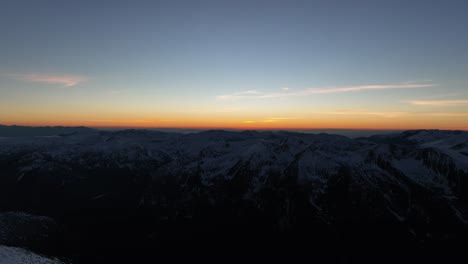 Drone-shot-above-Musala-peak,-summit-during-sunset,-dusk,-Bulgaria,-Rila-mountain,-highest-summit-on-the-Balkans,-clear-sky,-amazing,-stunning-view,-twilight,-blue-hour,-golden-hour
