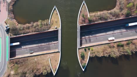 Aerial-Topdown-Ascent-over-Aqueduct-Waterbridge-in-Veluwemeer,-Netherlands