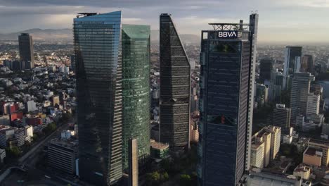 Mexico-City-Skyscrapers,-Aerial-View-of-Modern-Tower-Buildings-and-Cityscape,-Cinematic-Drone-Shot