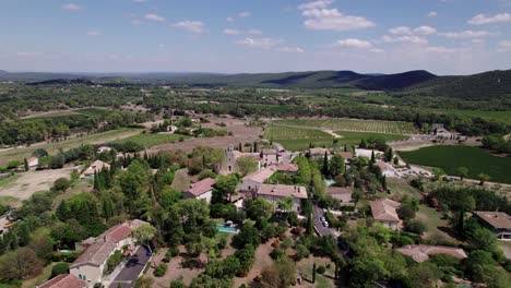 Aerial-establishing-drone-shot-overhead-a-luxurious-mansion-in-the-french-countryside
