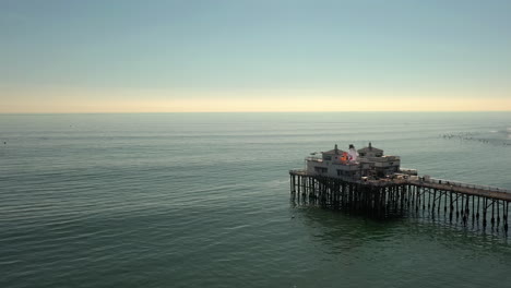 Drone-view-of-famous-Malibu-Pier-in-Malibu,-California,-Los-Angeles-County
