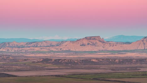 Bardenas-reales-navarra-desert-and-Pyrenees-as-background-during-winter-sunset-timelapse