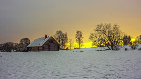 Time-lapse-of-wood-cottage-in-snowy-countryside