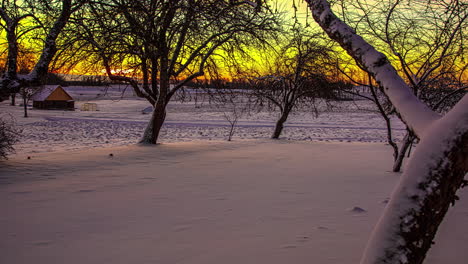 Glowing-sunrise-time-lapse-in-winter-snow-with-dynamic-motion