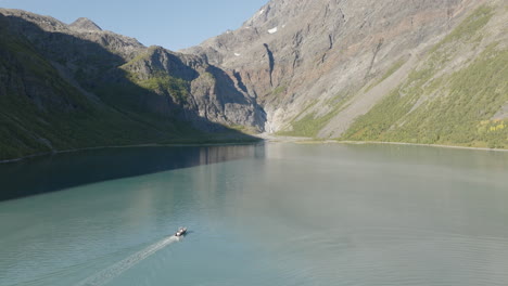 Cruising-On-Idyllic-Fjord-With-Lyngen-Alps-Near-Tromso,-Troms-og-Finnmark-County-In-Norway