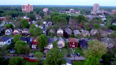 Aerial-dolly-right-of-typical-American-street-during-daytime