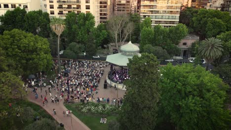 4k-30FPS-Drone-Footage-of-Band-Playing-at-Park-in-Buenos-Aires---Dolly-Shot