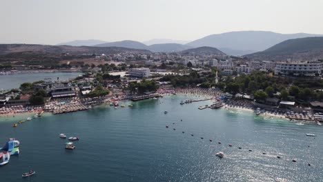 Aerial-view-of-Touristic-Summer-destination,-Waterfront-resort-in-Ksamil,-Albania