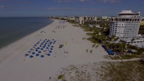4K-Drone-Video-of-Beach-Cabanas-and-Umbrellas-at-Bellwether-Resort-on-the-Gulf-of-Mexico-in-St