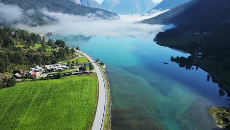 Drone-footage-of-beautiful-green-water-river-in-Stryn,-Norway