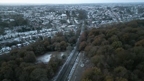 Town-Wooded-Suburbs-Frosty-Winter-Morning-Aerial-Landscape-Kenilworth-UK-Train-Track