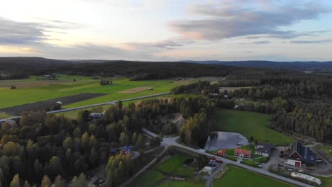 Drone-footage-over-fields-and-forrest-in-Sweden-