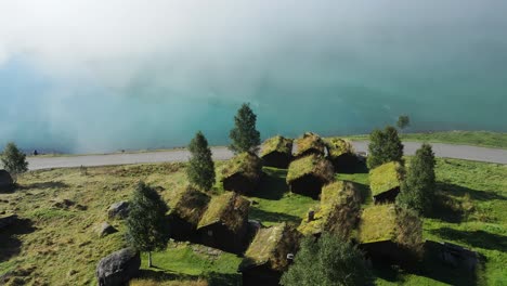 Lovatnet-glacier-lake-and-Breng-seter-historical-farm-houses-in-mist