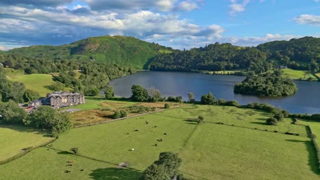 Cinematic-summer-aerial-view-of-the-Lakeland-town-of-Grasmere
