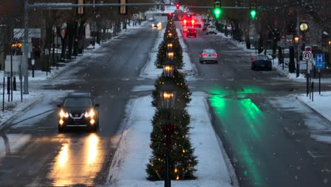 Slow,-cinematic-rising-aerial-with-zoom-lens-of-lamps-and-Christmas-trees-lining-main-street-of-Wellsboro,-PA-in-Tioga-County