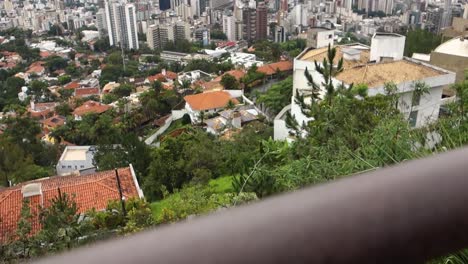 tilt-up-reveals-amazing-metropolis-of-Belo-Horizonte-city,-in-Brazil,-at-cloudy-day
