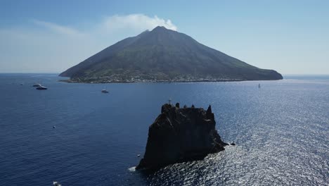 Active-Volcano-Stromboli-and-Strombolicchio-at-Aeolian-Islands,-Italy---Aerial-4k
