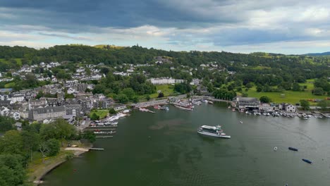 Cinematic-aerial-view-of-the-busy-tourist-town-of-Bowness-on-Windermere