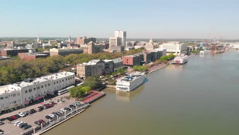 Aerial-view-of-historic-savannah-water-front-with-parked-cars-and-buildings-lined-up