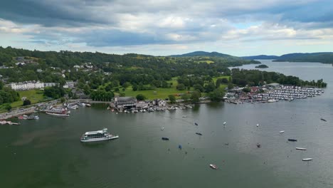 Cinematic-aerial-view-of-the-busy-tourist-town-of-Bowness-on-Windermere