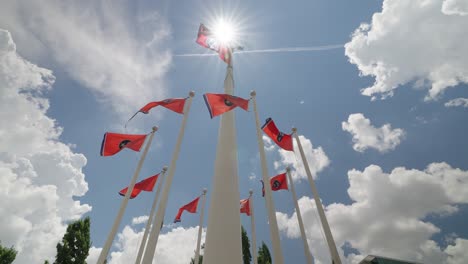 Tennessee-state-flags-waving-in-the-wind-on-flagpoles-in-a-park-in-Nashville