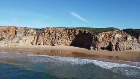 beliche-beach-near-sagres,-nice-waves-rolling-in-the-bay,-perfect-sunny-weather
