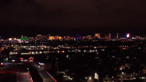 Super-wide-rising-aerial-shot-of-the-Las-Vegas-Strip-at-night