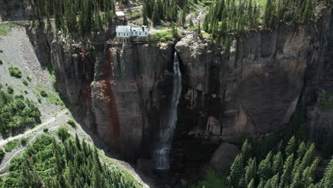 Aerial-View-of-Bridal-Veil-Falls,-Uncompahgre-National-Forest,-Telluride,-Colorado-USA-and-Historic-Power-Plant