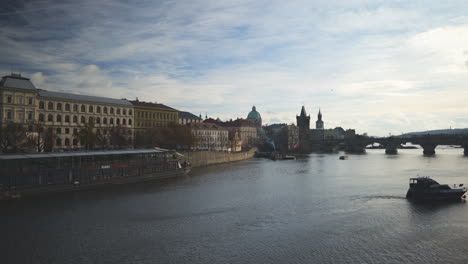 Prague-Vltava-embankment-and-Charles-bridge-Timelapse-view-on-a-sunny-day