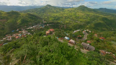 FPV-Aerial---Flying-above-a-Filipino-village-in-Cebu,-Philippines