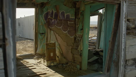 Slider-Shot-of-Abandoned-Building-in-Desert