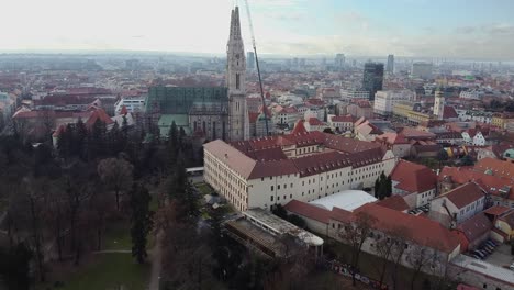 Aerial-view-of-the-city-Zagreb-in-Croatia-flying-above-the-art-park-and-towards-the-cathedral