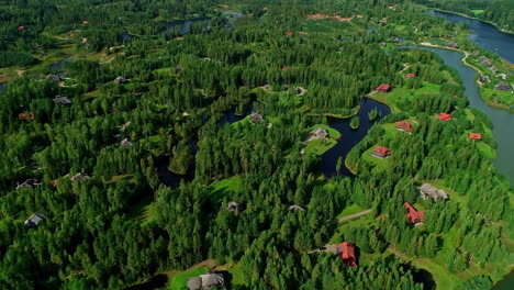 Establishing-shot-of-Lake-houses-surrounded-by-forests
