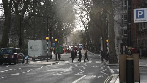 13-January-2023---People-Crossing-The-Road-On-Millbank-Road-In-Westminster
