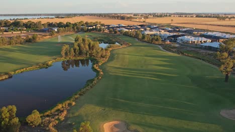 Yarrawonga,-Victoria,-Australia---31-December-2022:-Early-evening-watering-of-greens-and-fairways-on-Black-Bull-Golf-Course-at-Yarrawonga