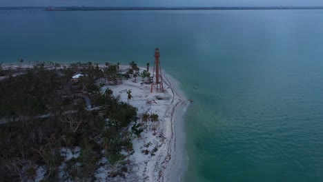 Drone-video-pushing-back-toward-the-ocean-to-reveal-the-Sanibel-Lighthouse-Park