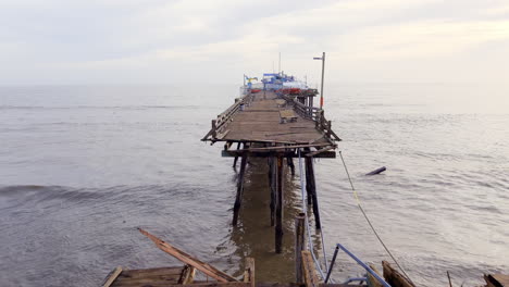 Severe-damage-at-Capitola-Wharf-after-storms-in-California,-January-2023---close-aerial-inspection