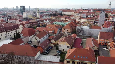 Aerial-of-the-old-town-of-Zagreb,-Croatia-with-the-modern-office-buildings-in-the-background