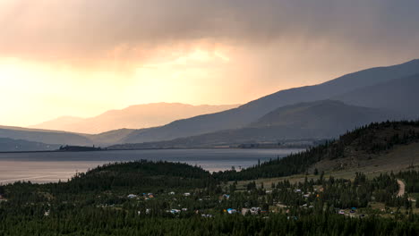 Time-lapse-of-the-sun-setting-behind-storm-clouds-looming-over-Lake-Dillon-in-Colorado's-Rocky-Mountains