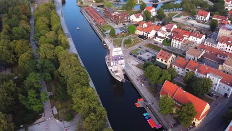 AERIAL-Orbiting-Shot-of-the-Ship-Meridianas-in-Klaipeda,-Lithuania