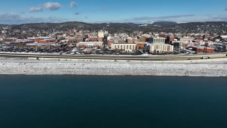 Aerial-truck-shot-of-snow-covered-Williamsport-Pennsylvania-during-winter